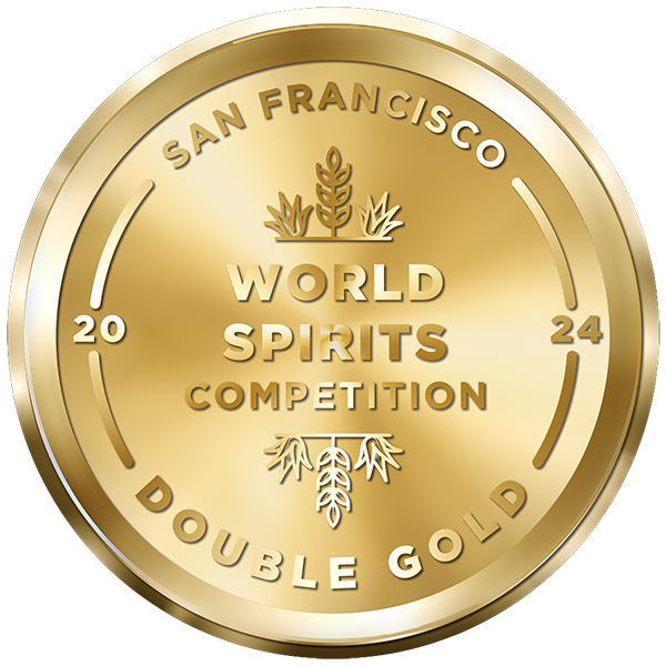 A gold medal for the 2024 San Francisco World Spirits Competition. The front of the medal reads "SAN FRANCISCO WORLD SPIRITS COMPETITION 2024 GOLD" with an image of grain stalks in the center.