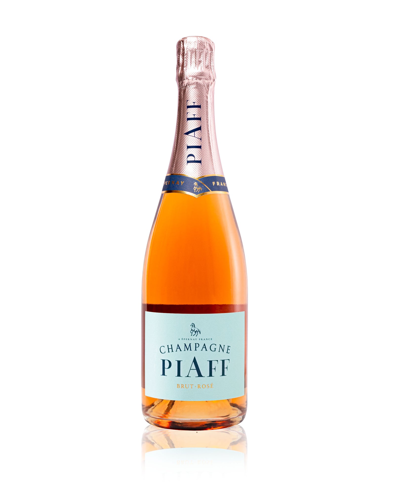 A bottle of Champagne PIAFF Brut Rosé NV from champagne-piaff is showcased against a white background. The bottle features a pink foil top and a light blue label with the text "Champagne PIAFF Brut Rosé." The label also includes an emblem of a horse, hinting at notes of fresh strawberry and vibrant red fruits.