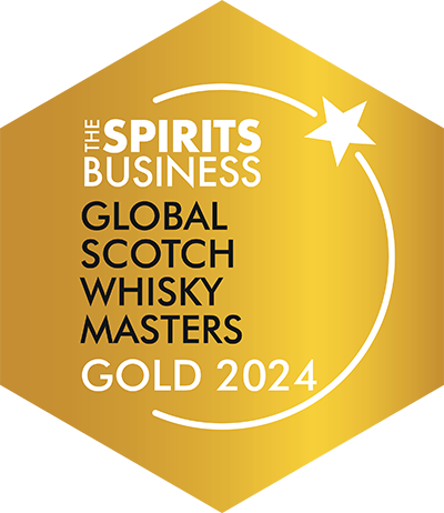 A gold badge with white text and a white star design reads, "The Spirits Business Global Scotch Whisky Masters Gold 2024.