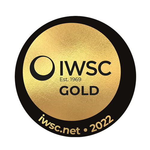A circular gold and black badge with "IWSC" and "Est. 1969" in bold, black letters at the center. "GOLD" is written below. The rim of the badge reads "iwsc.net" at the bottom and "2022" on the right side.