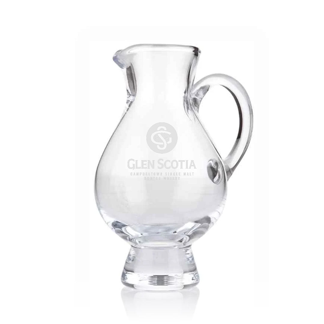 The Glencairn Water Jug with Glen Scotia Logo is a transparent glass pitcher featuring a round base, a small spout, and a curved handle. The center of the jug displays the Glen Scotia logo along with the text "Campbeltown Single Malt." Ideal as whisky gifts, this pitcher is showcased against a plain white background.