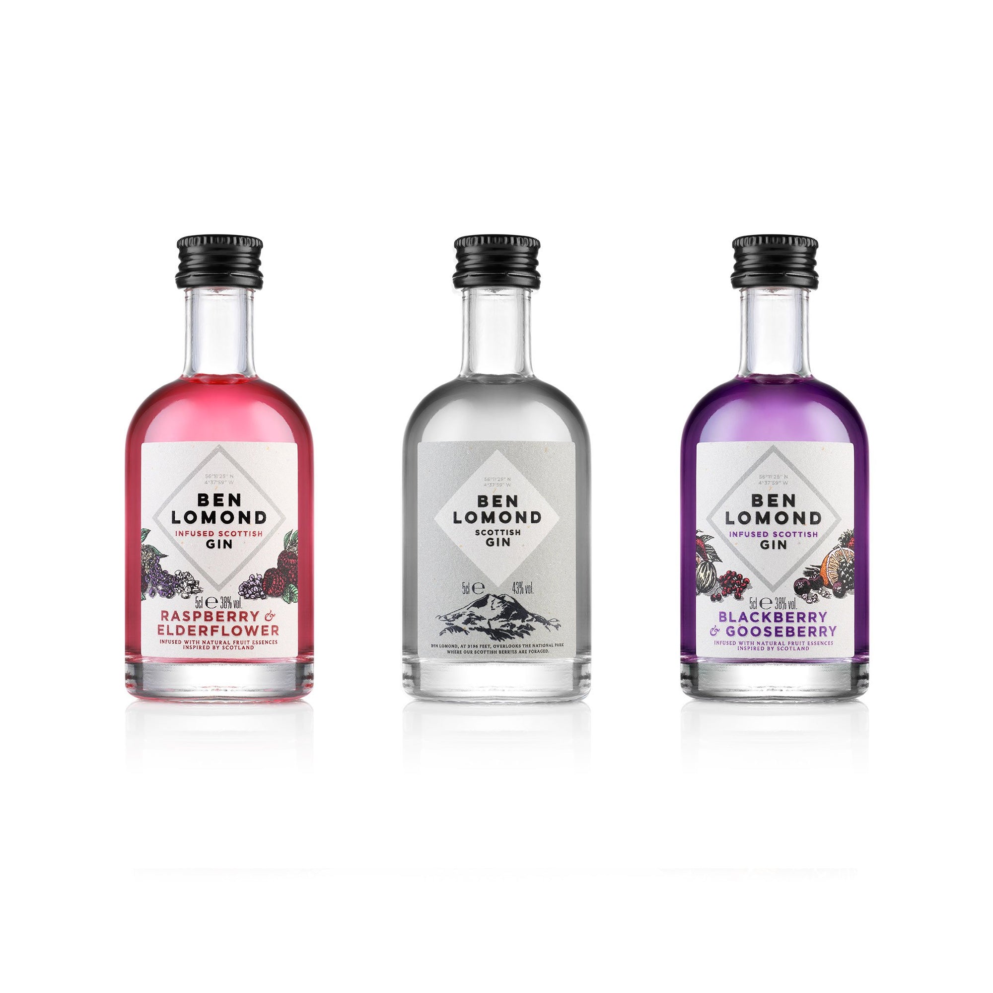 The Ben Lomond Gin Gift Set from Ben Lomond includes three 50ml bottles of Scottish gin in Raspberry & Elderflower, Original, and Blackberry & Gooseberry flavors. The packaging is adorned with illustrations of fruits and botanicals along with the phrase "Inspired by Scotland," making it an ideal addition to whisky gifts.