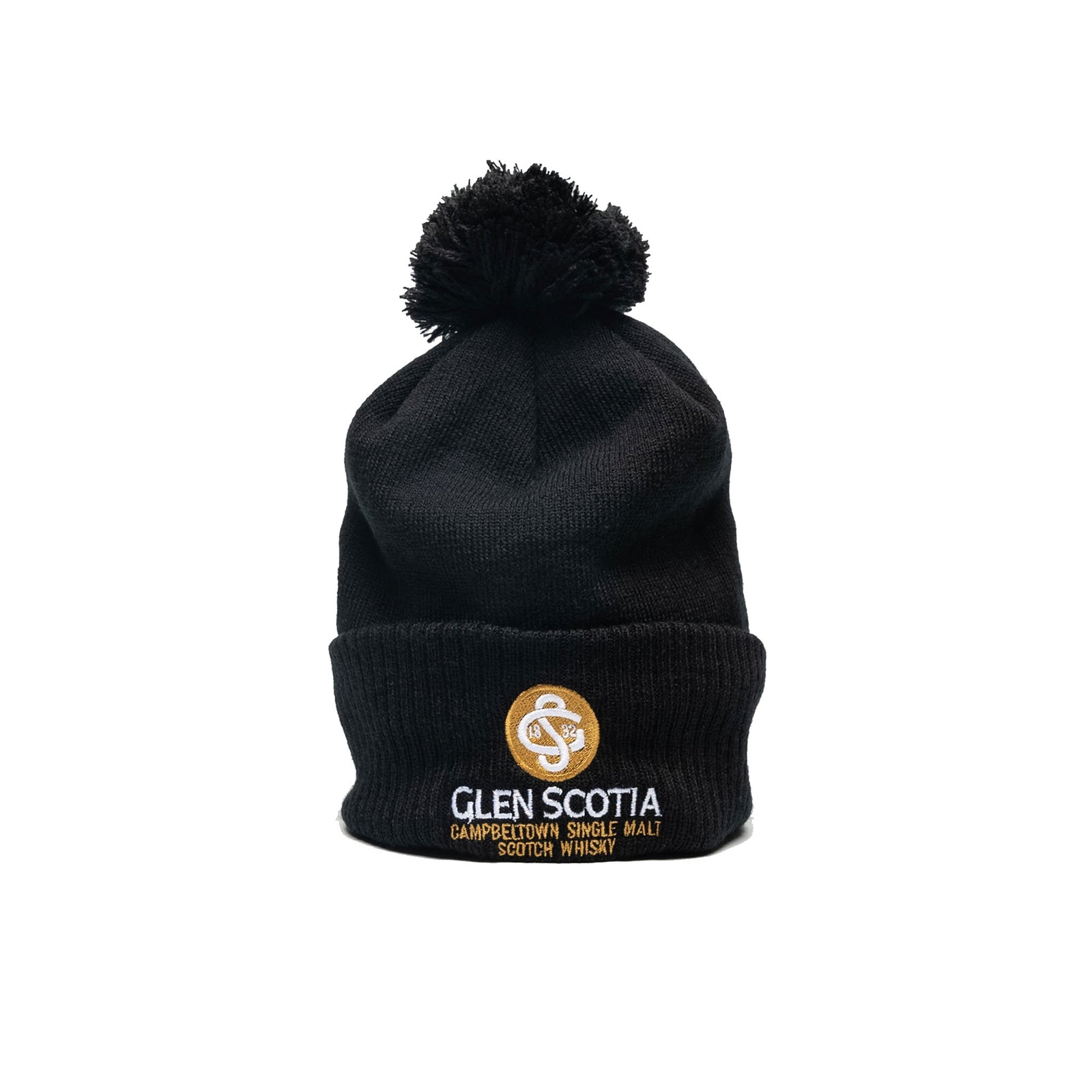 The Glen Scotia Beanie Bobble Hat is a black cold-weather accessory with a pom-pom on top and a folded brim, featuring the Glen Scotia logo embroidered on the brim in gold accents along with "Glen Scotia Campbeltown Single Malt Scotch Whisky.