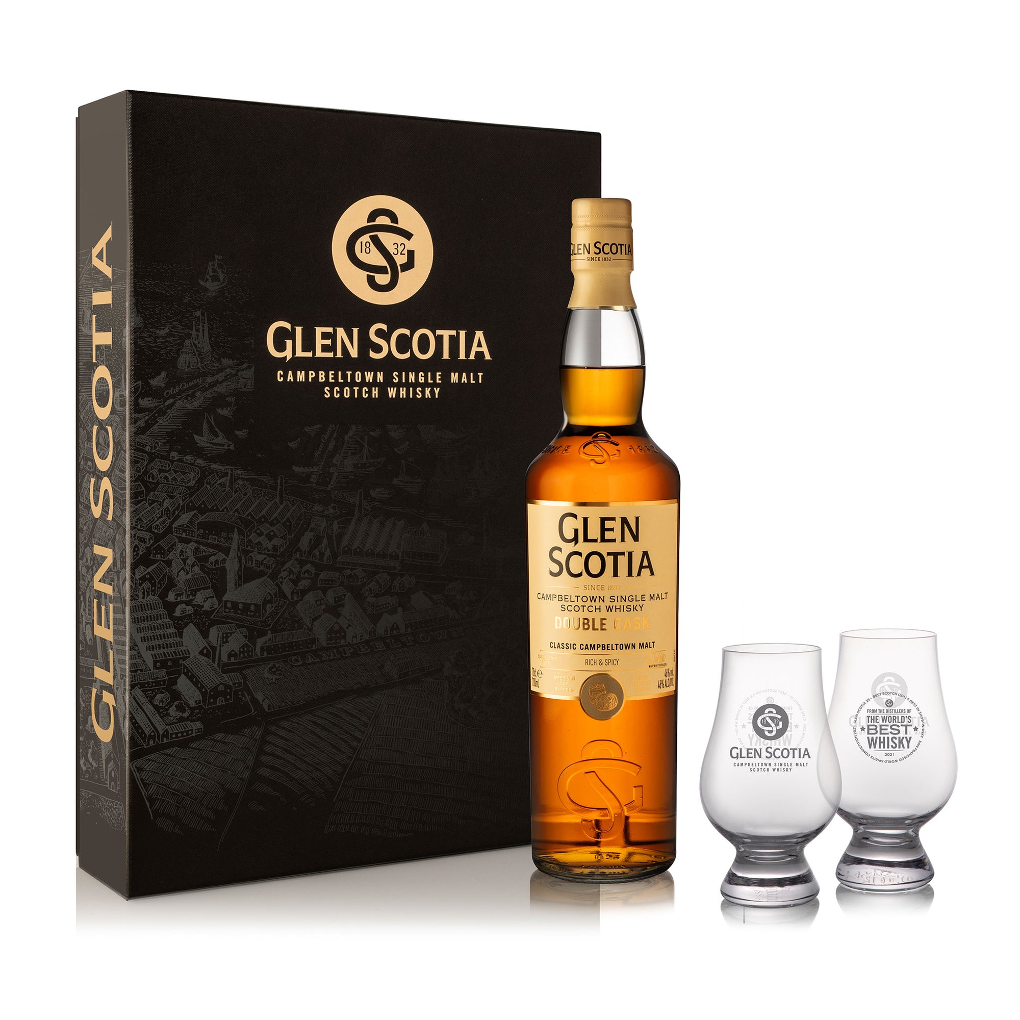 Image shows a bottle of Glen Scotia Double Cask Whisky next to its black and gold packaging. Two branded whisky glasses are placed beside the bottle, completing this elegant Double Cask Whisky Gift Set with glasses. The packaging features an embossed design and the Glen Scotia logo.