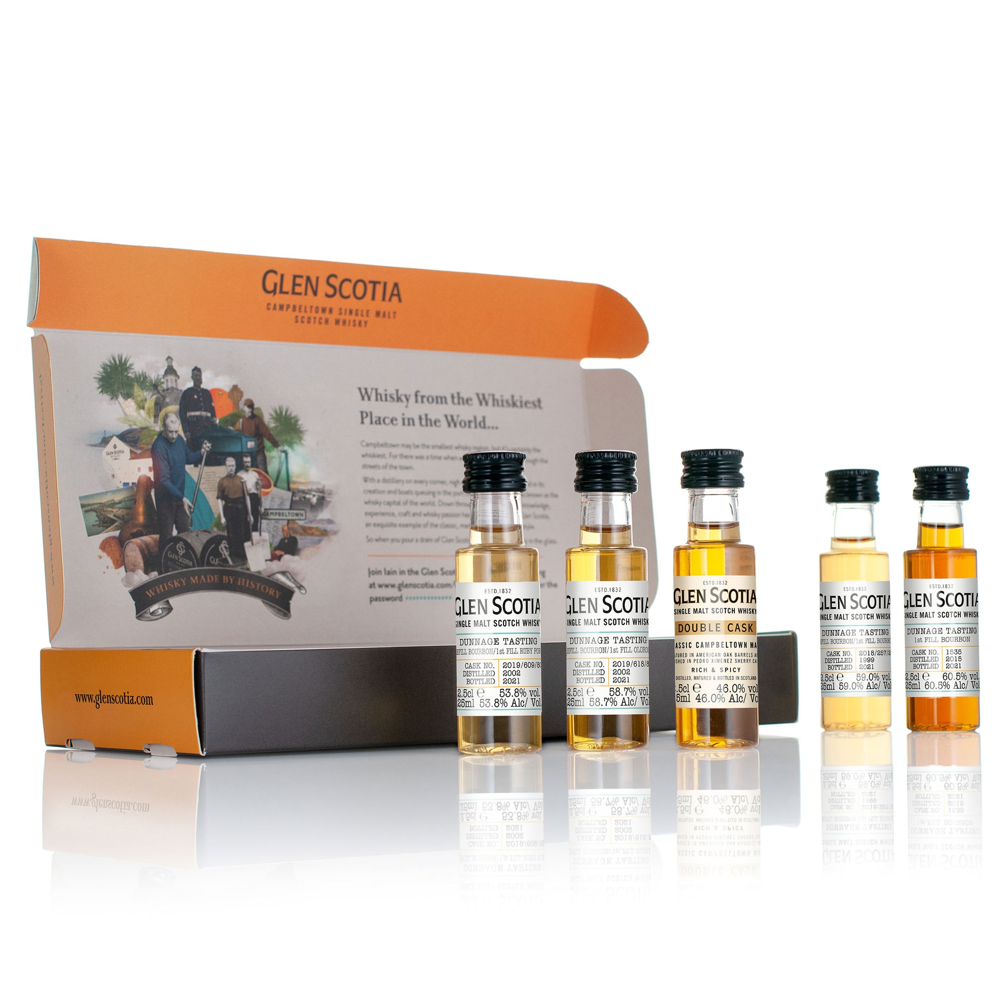 An open box labeled "Dunnage Whisky Tasting Gift Set" from Glen Scotia, displaying five miniature whisky bottles. The inside of the lid showcases historical imagery and detailed text about Campbeltown single malts, inviting customers to join a Dunnage Whisky Tasting Experience with Master Distiller Iain McAlister.