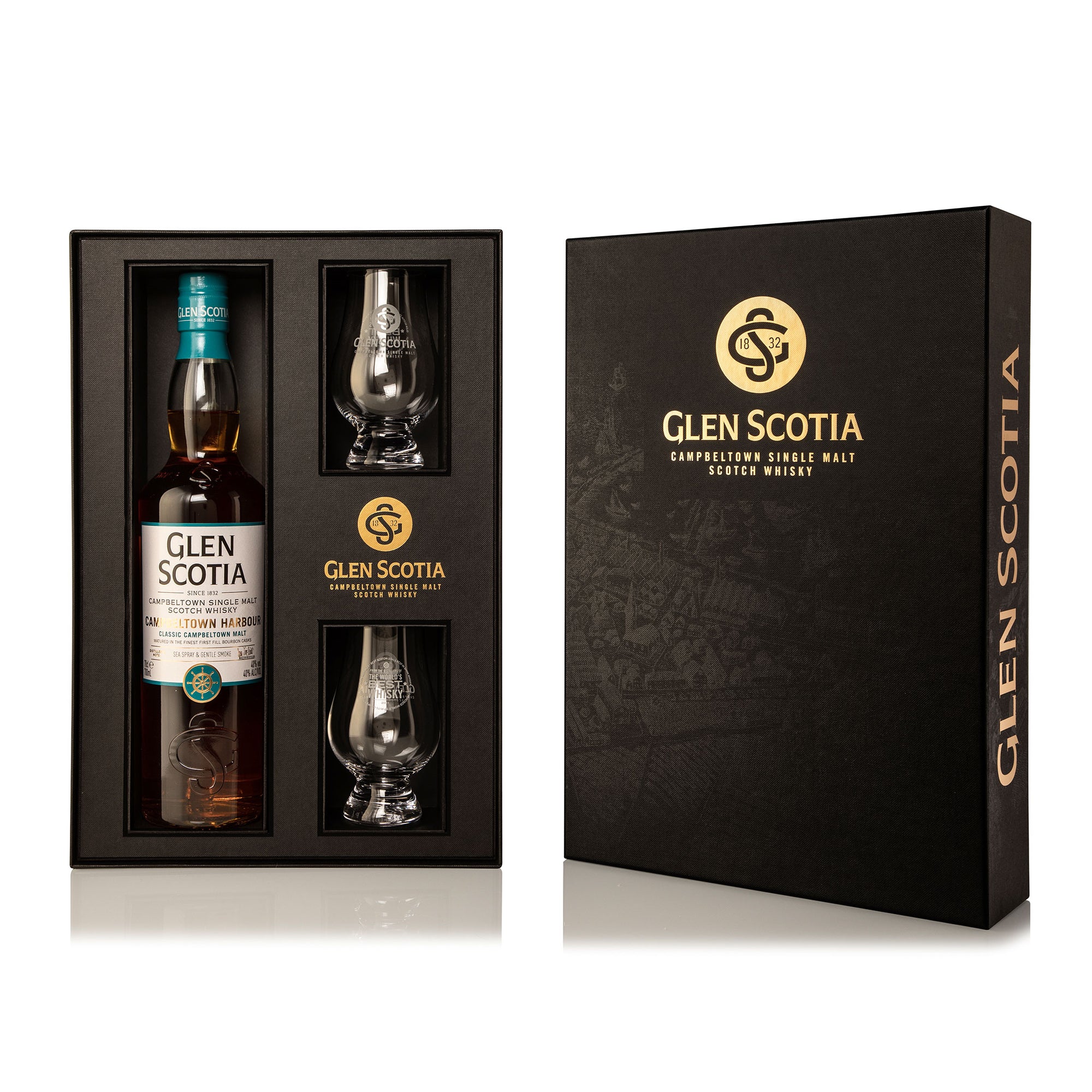 A bottle of Glen Scotia Harbour Whisky is displayed alongside two tasting glasses. The bottle and glasses are positioned in front of a black and gold decorative box featuring the Glen Scotia logo and branding.