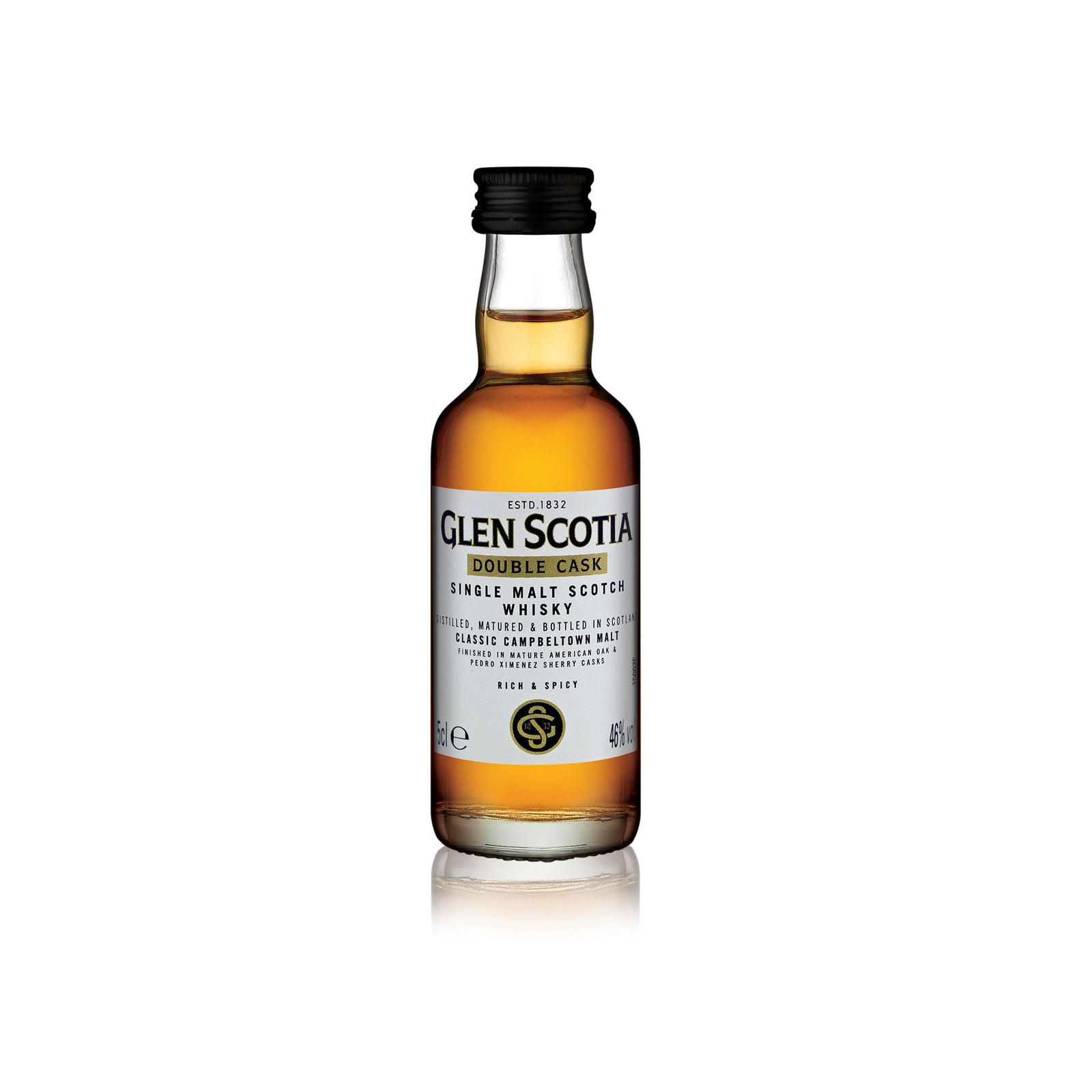 A miniature bottle of Glen Scotia Double Cask Single Malt 5cl Whisky. The bottle features a black cap and a white label with black and gold text. The amber-colored whisky has an ABV of 46%. Ideal for whisky gifts, the bottle is isolated on a white background.