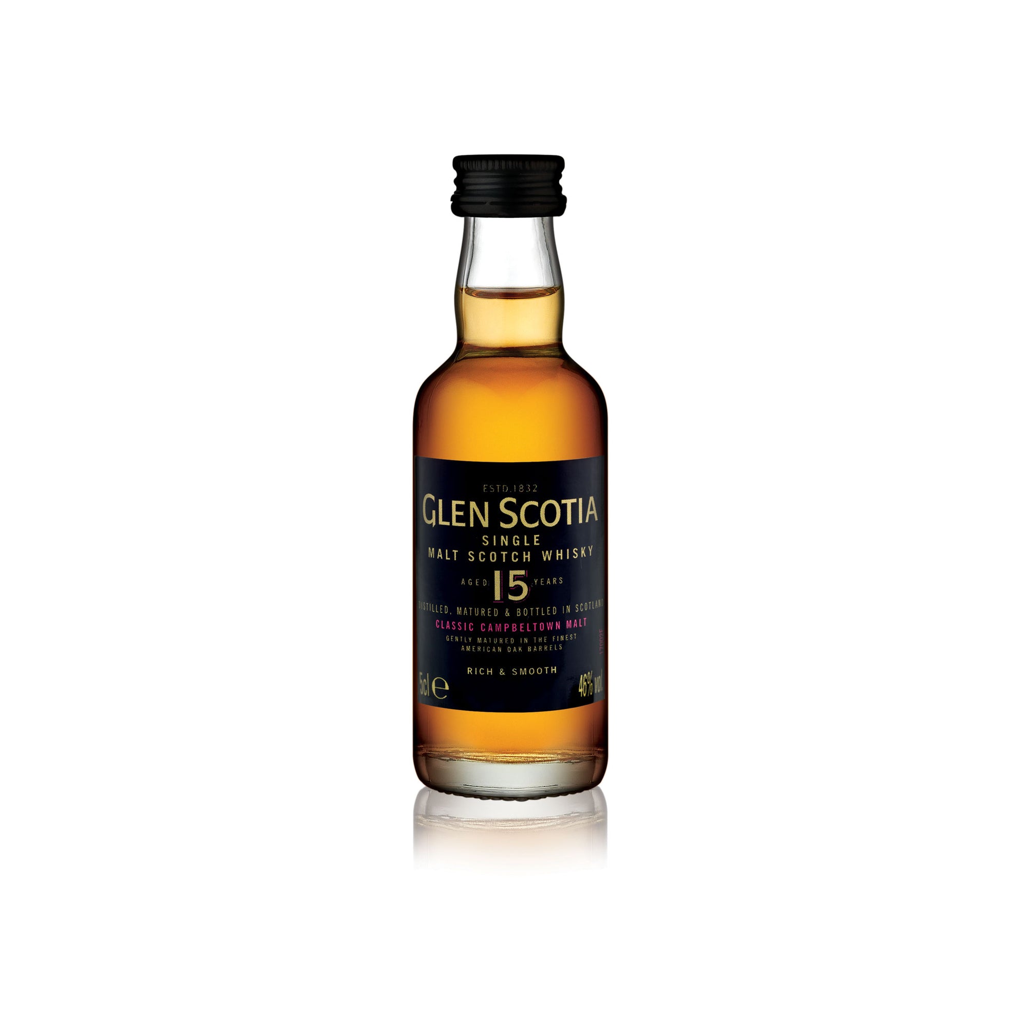 A small 5cl bottle of Glen Scotia 15 Year Old Whisky Miniature. The mini bottle features a black cap and label adorned with gold and white text showcasing the whisky's details. This amber-colored spirit is 46% ABV and described as "rich & smooth." It's an impeccable gift for any whisky connoisseur.