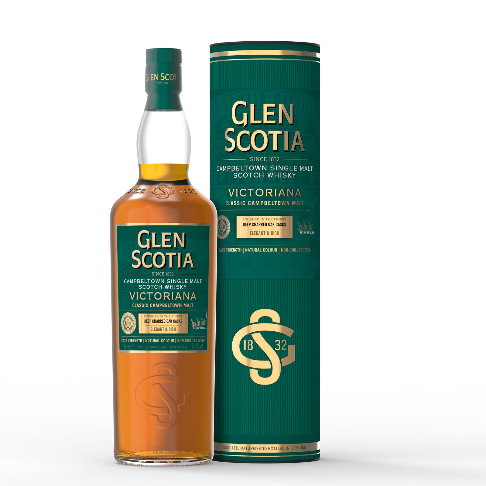A bottle of Glen Scotia Victoriana Single Malt - Global Travel, presented in a green cylindrical box. The bottle features a green label with gold and white text, and the box showcases similar branding and information about its deep charred oak casks and bottled strength—ideal for whisky gifts.